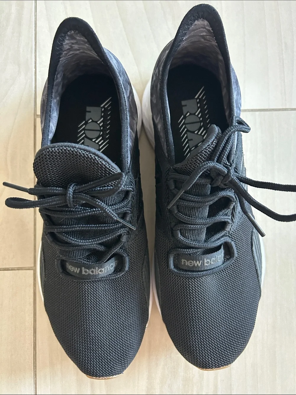 New Balance Men's Black and White Athletic Sneakers with Gum Outsole
